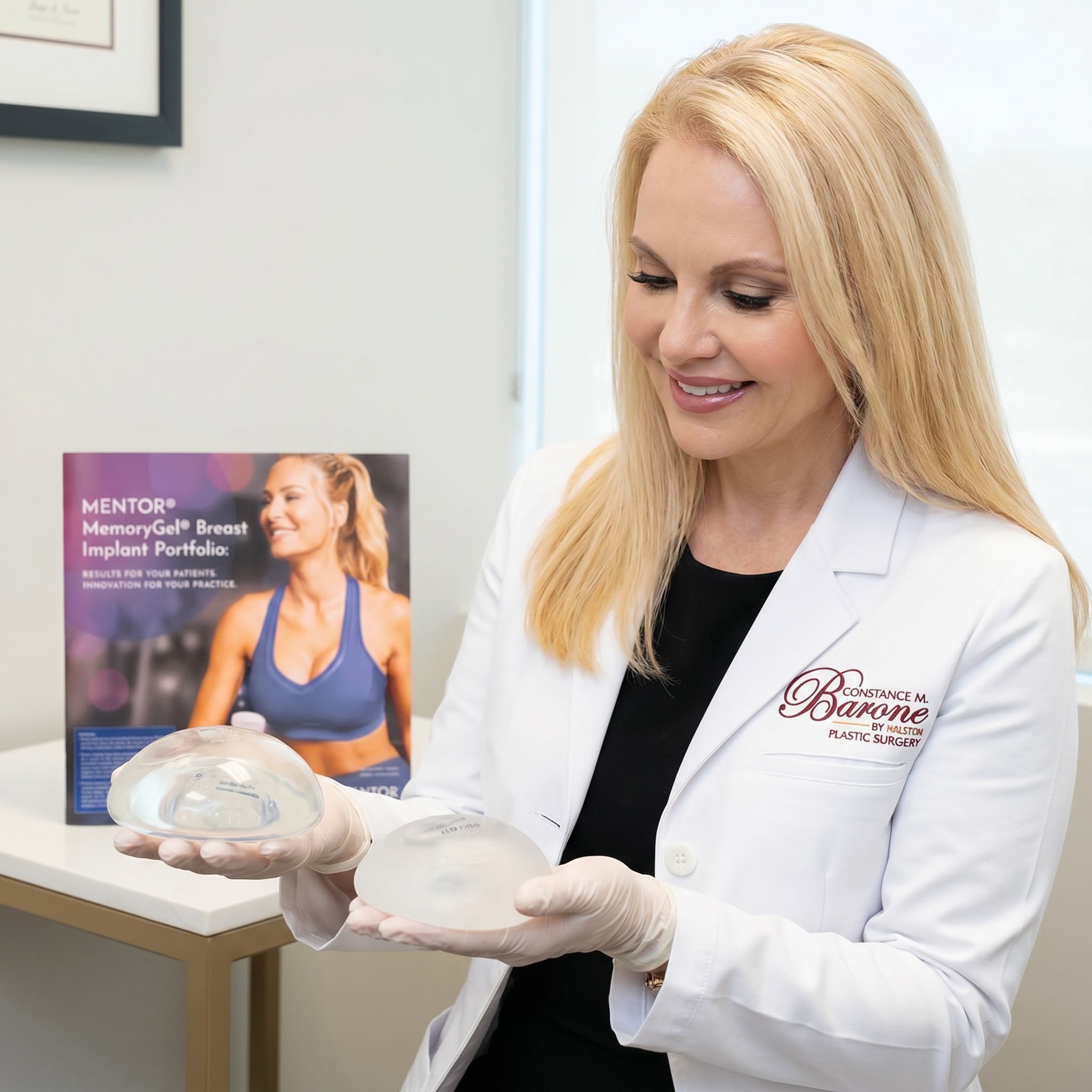 Dr. Barone holding implants