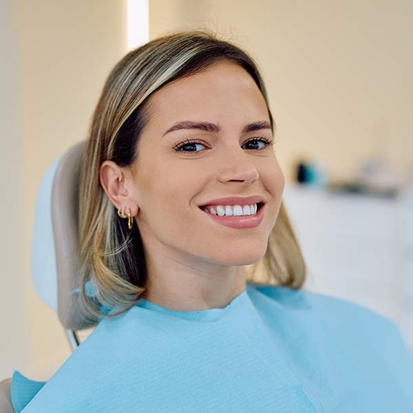 young blonde woman smiling