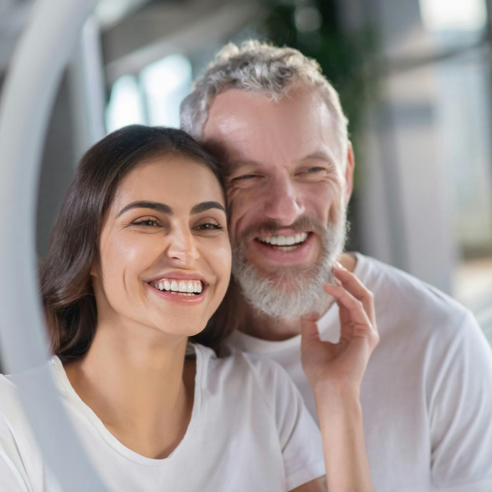 Man and woman smiling