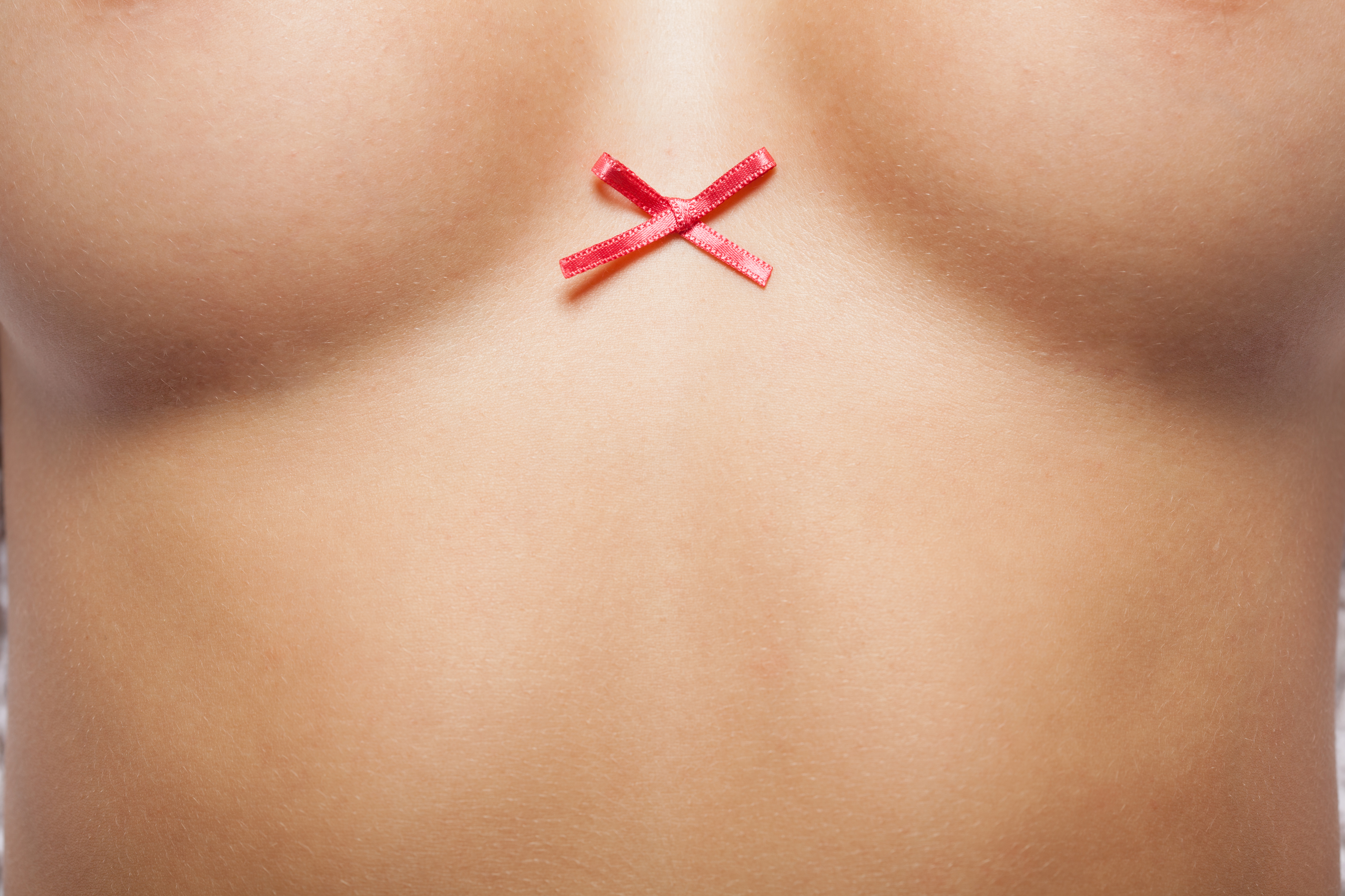 breast cancer ribbon on torso