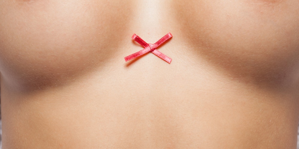 breast cancer ribbon on torso