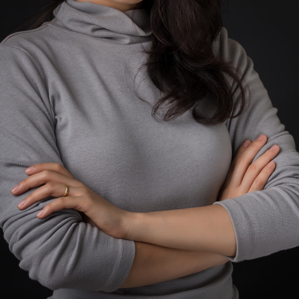 Woman in protective loose clothing