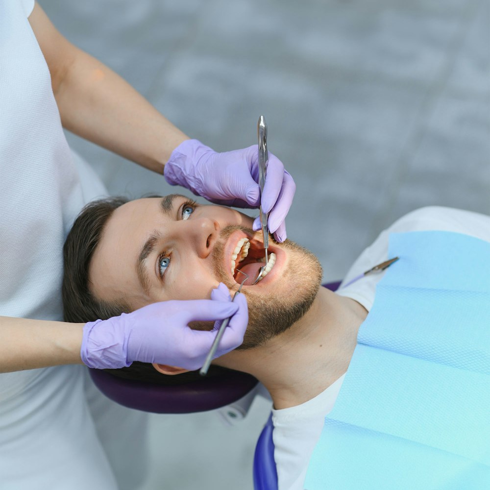 Man getting his teeth cleaned