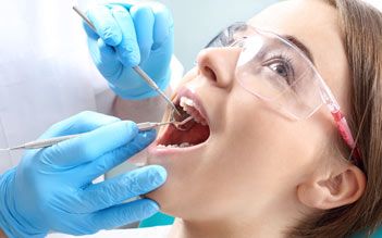Woman undergoing cleaning