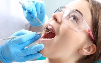 Woman undergoing cleaning