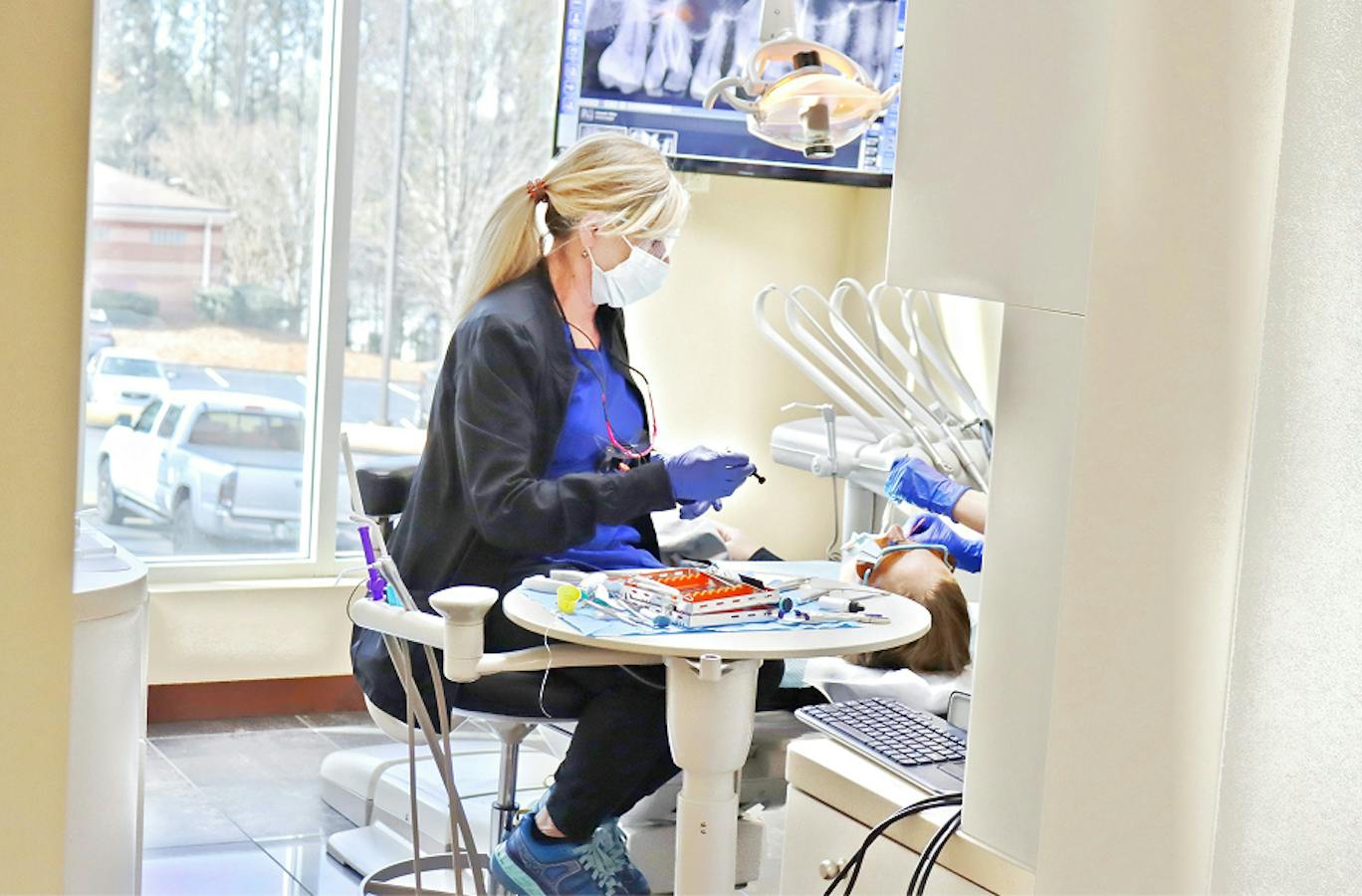 hygienist with patient during appointment