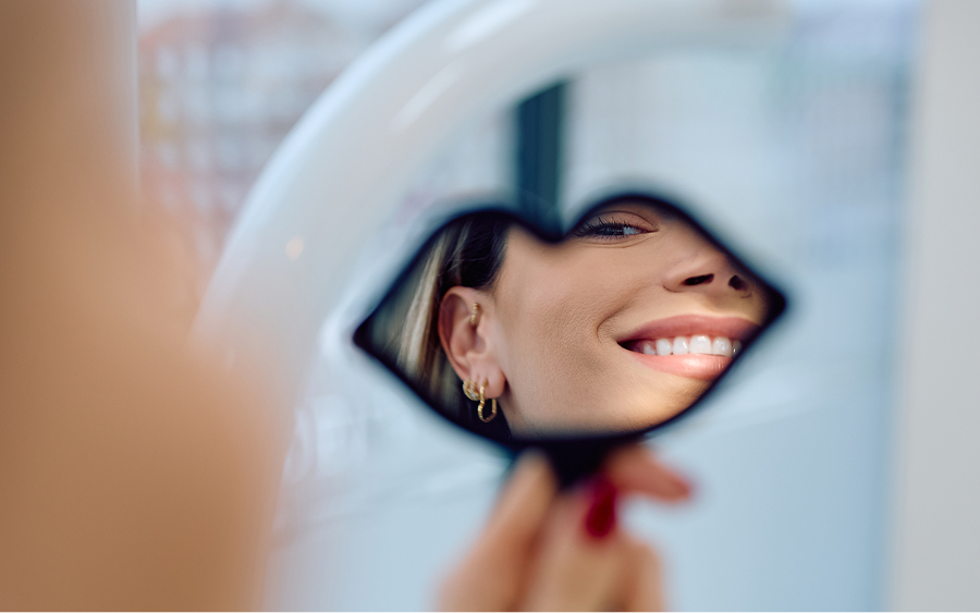 Woman smiling in mirror