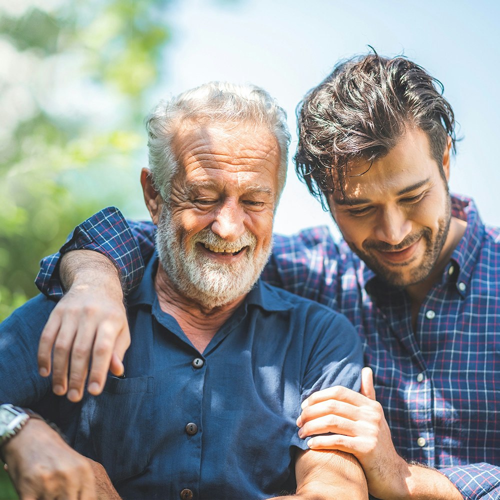 Smiling older man and younger man