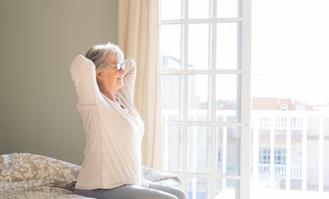 Senior woman waking up