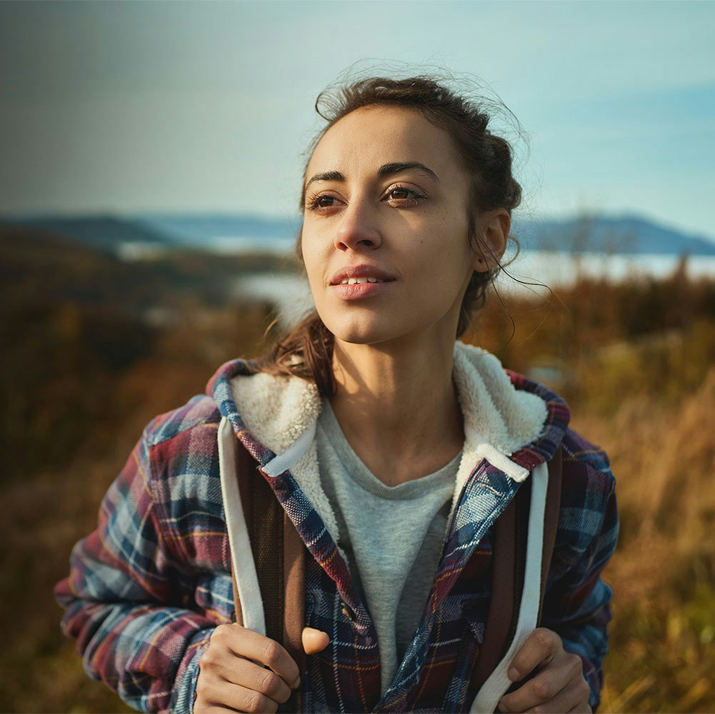 young woman hiking outdoors