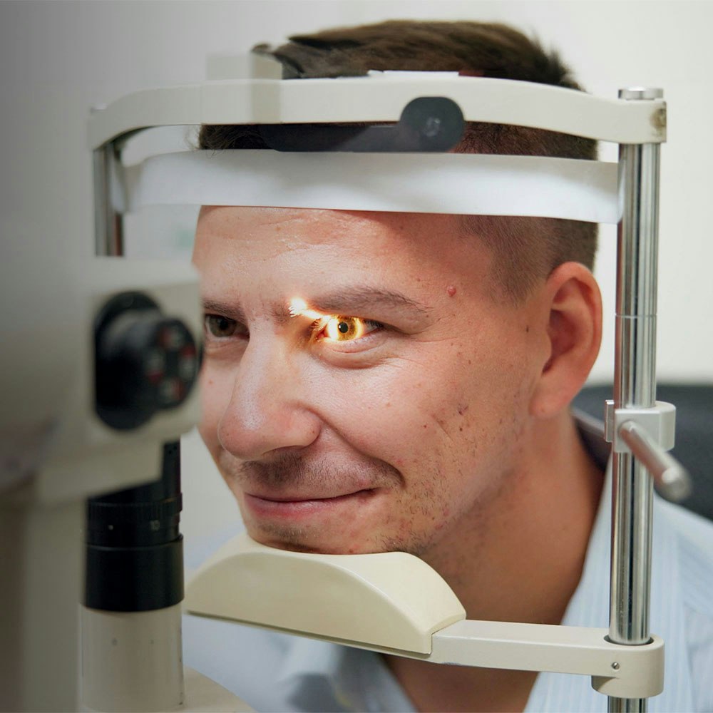 man getting his eyes checked