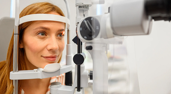 Woman getting her eyes examined