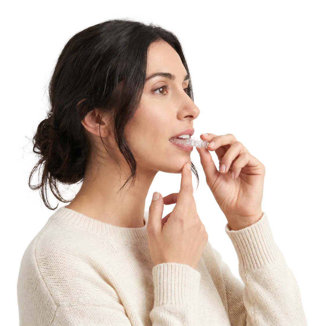 Woman placing a clear aligner