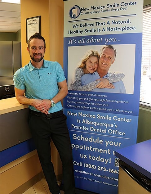 Dr. Steve Ollason at the front desk of our Albuquerque, NM, dental office