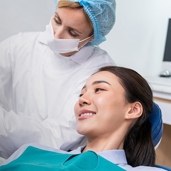 woman smiling in mirror