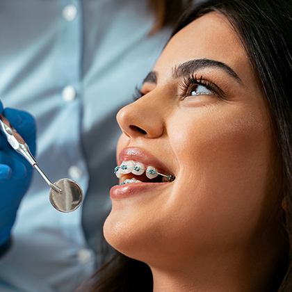 smiling woman with braces
