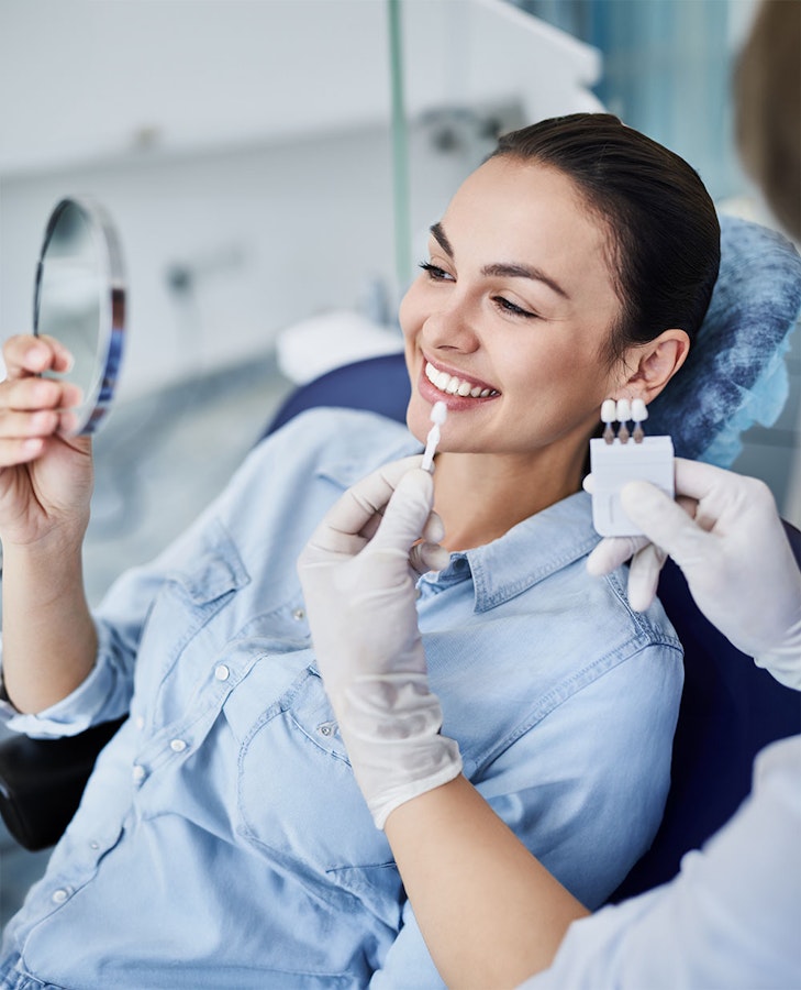 Woman having a veneers consultation