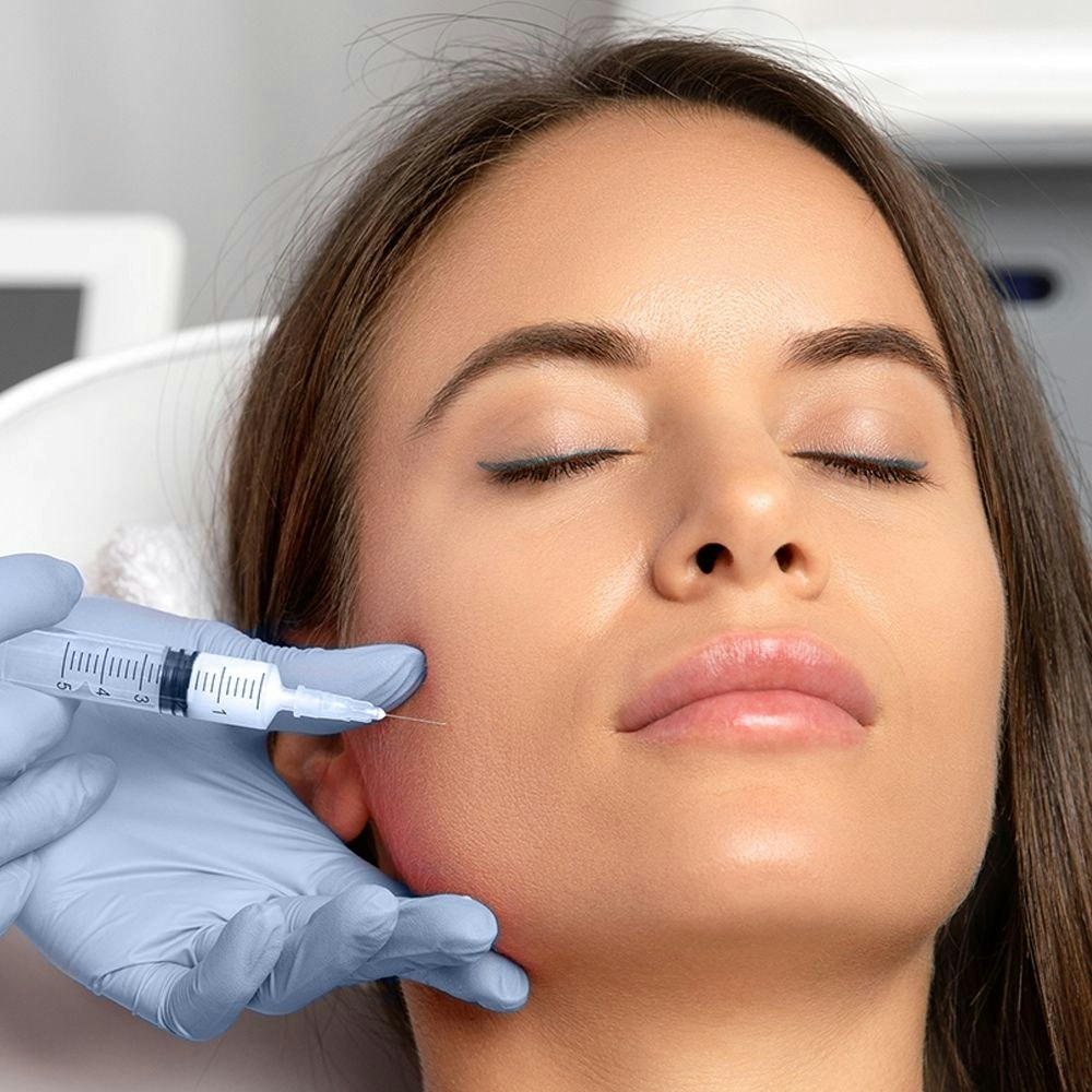 woman receiving BOTOX injection