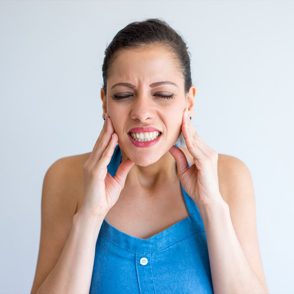 Woman with TMJ pain