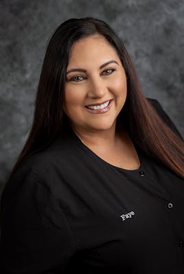 headshot of our front desk representative, Faye