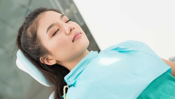 woman relaxing in dentist's chair