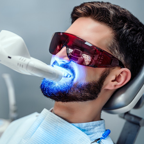Patient getting teeth whitening