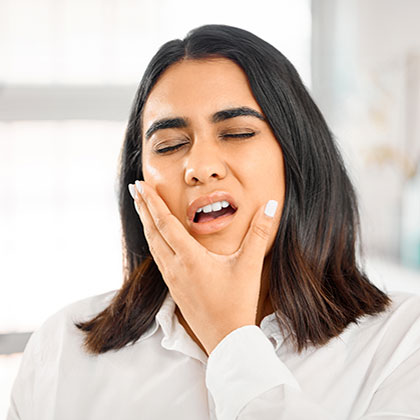 woman in dental pain