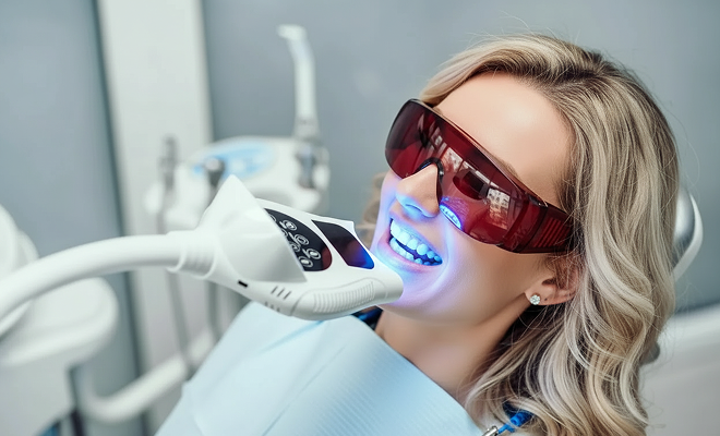 woman getting her teeth professionally whitened