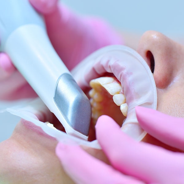 Man Undergoing Ozone Therapy on Gums