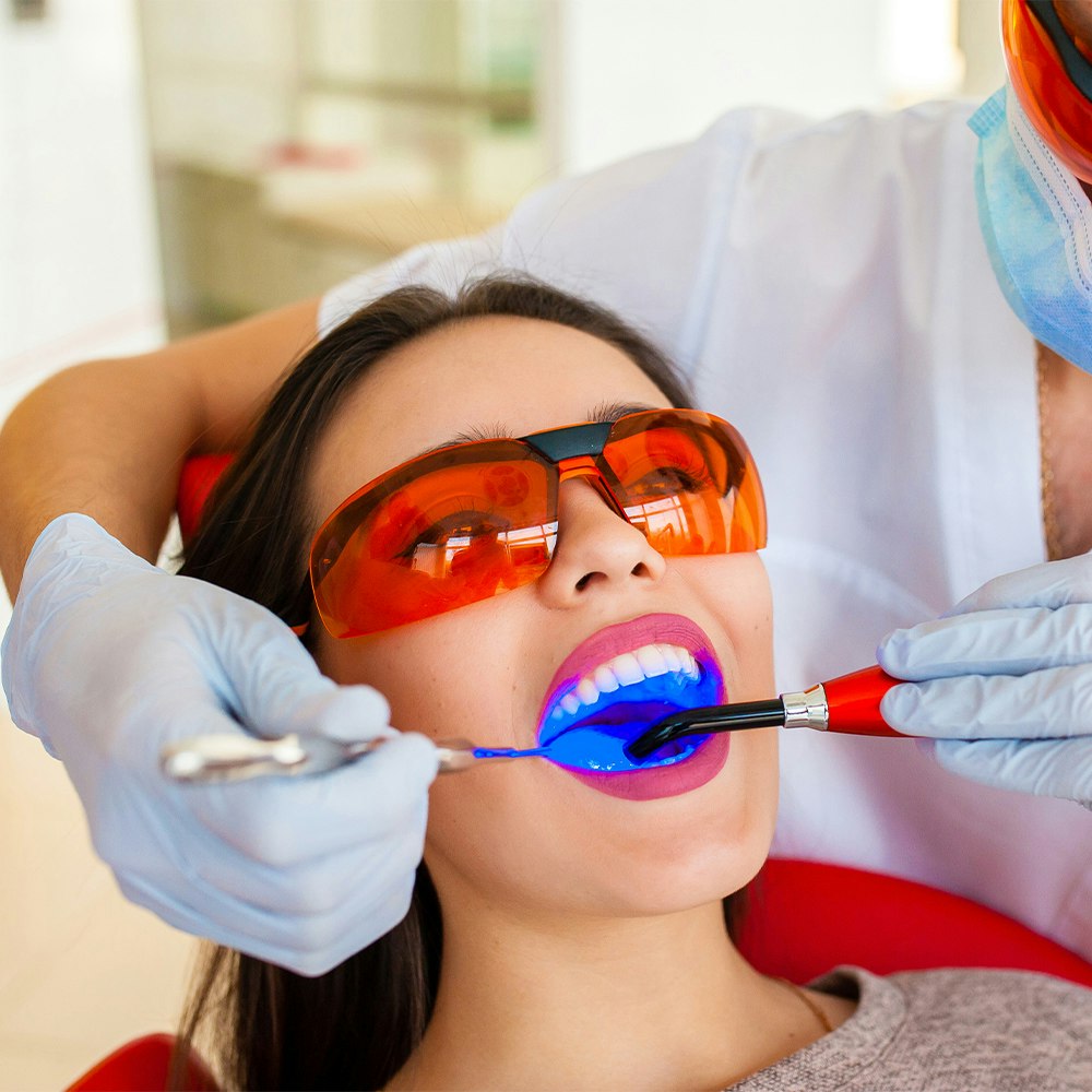 a woman getting dental fillings
