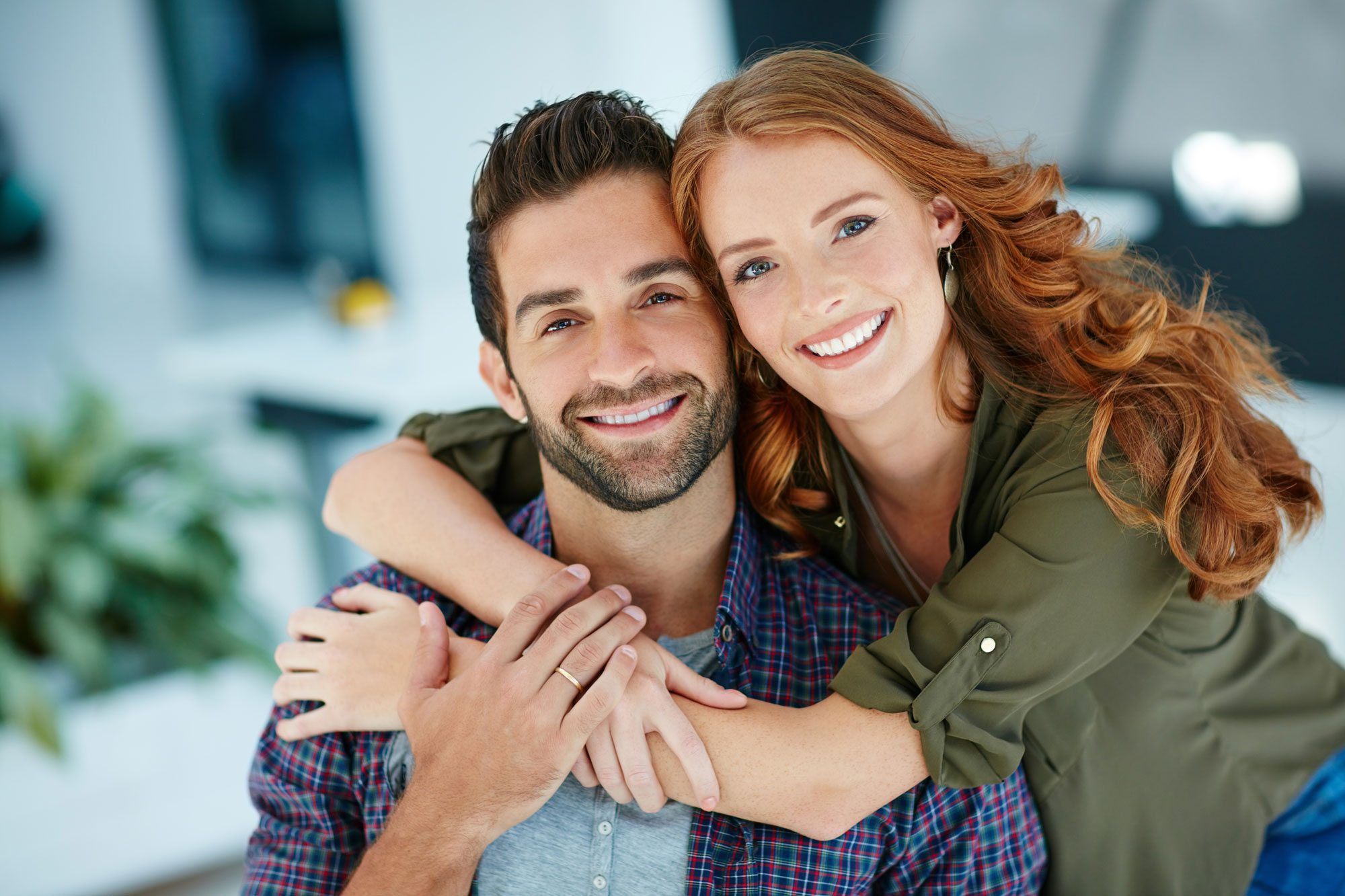 Happy couple with healthy smiles