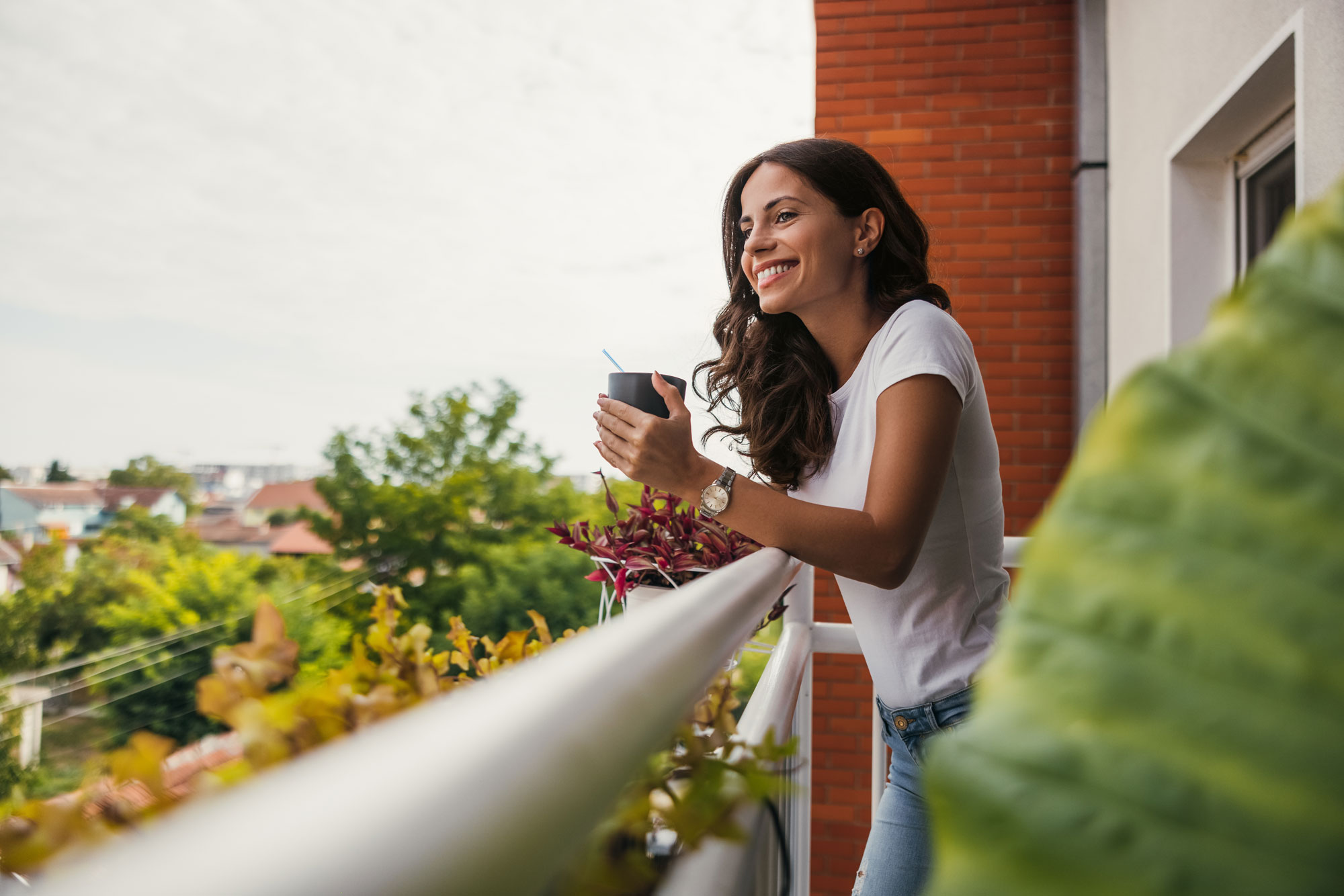 woman standing on balcony