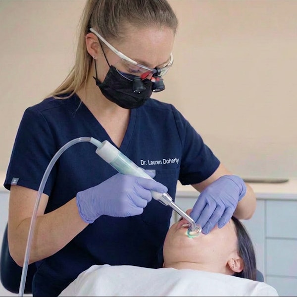 Dr. Lauren Doherty treating patient with ozone therapy