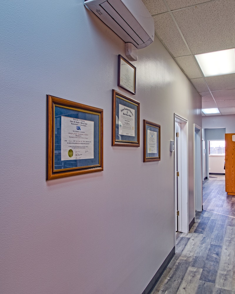 Certificates and diplomas on hall wall
