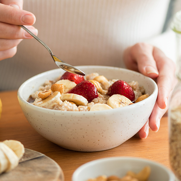 A person eating oatmeal