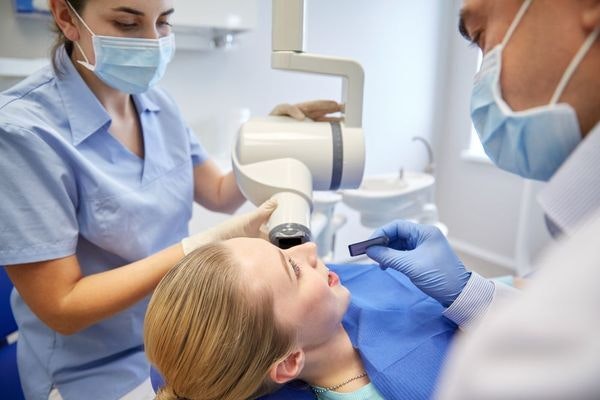 Woman getting dental x-rays