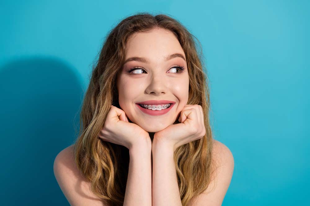 Smiling woman with braces