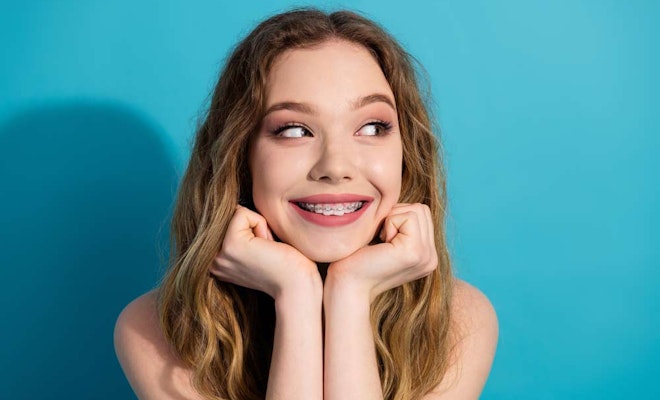 Smiling woman with braces