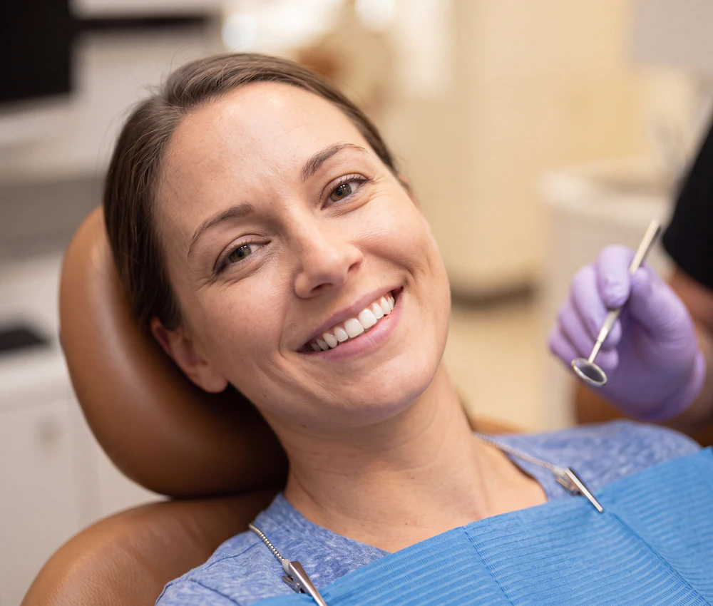Smiling woman in the exam chair