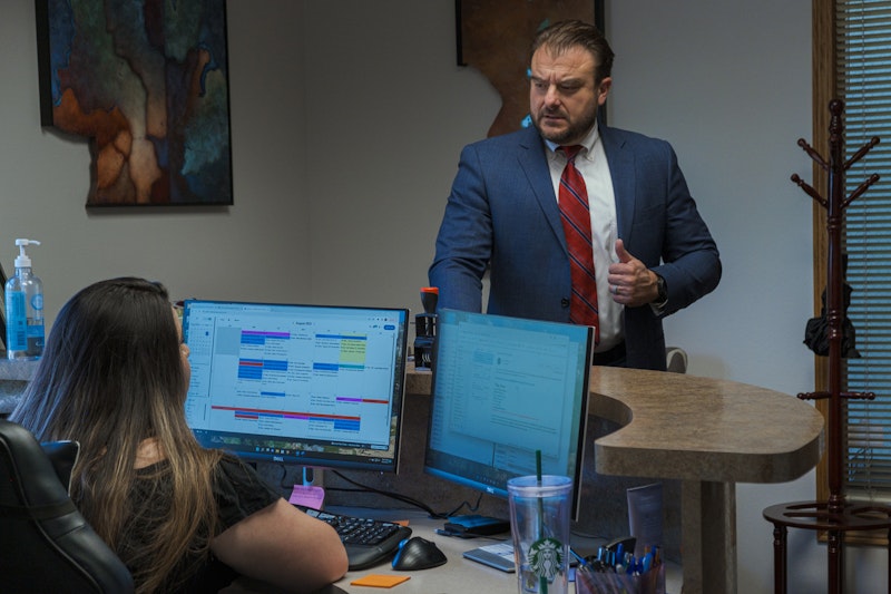 David Partovi checking in with receptionist