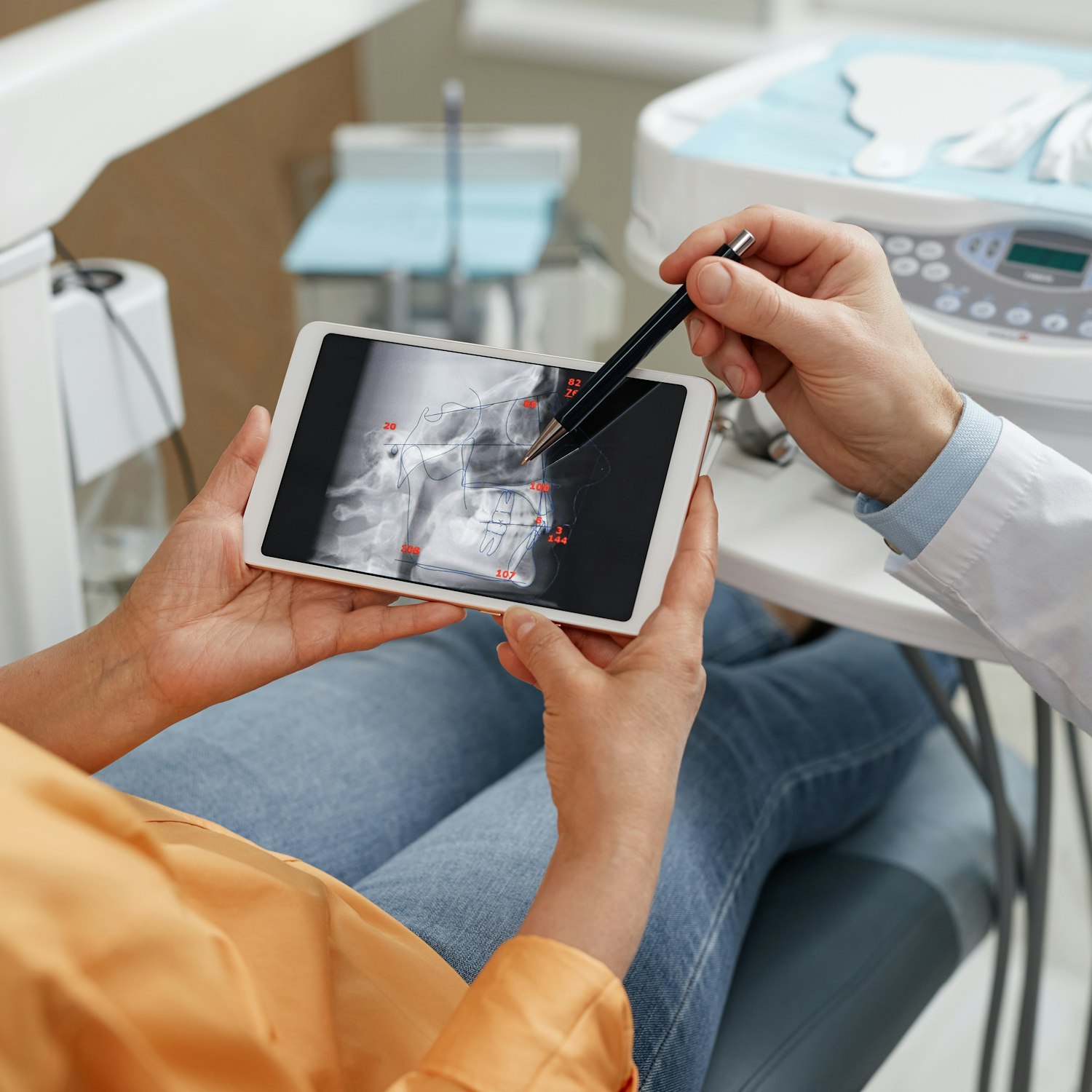 patient reviewing digital x-ray
