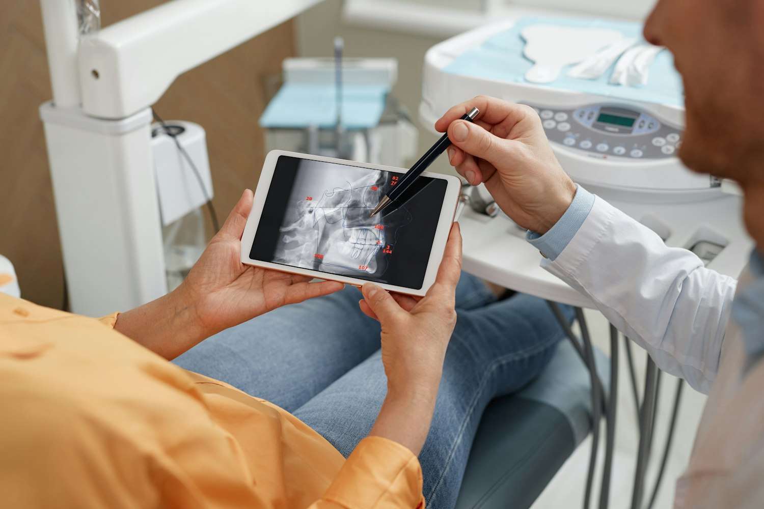 patient reviewing digital x-ray
