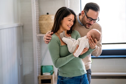 Couple holding baby