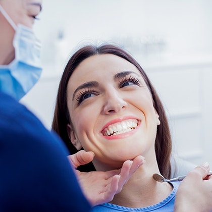 Woman smiling at dentist