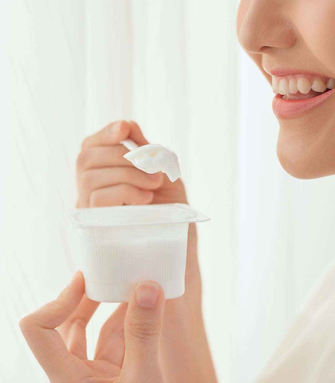 Person eating yogurt