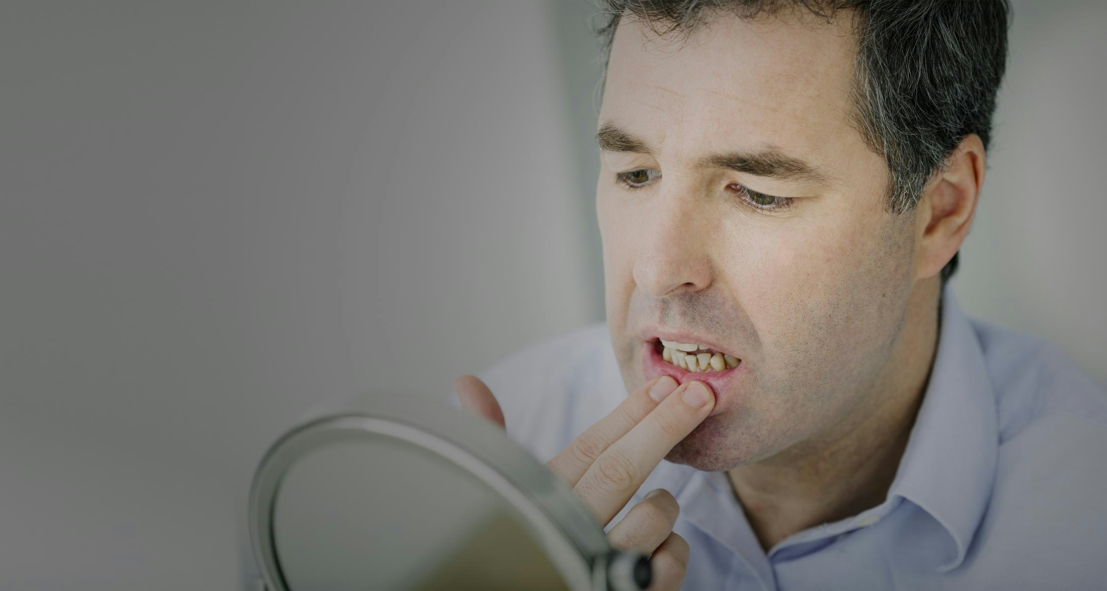 man looking in the mirror