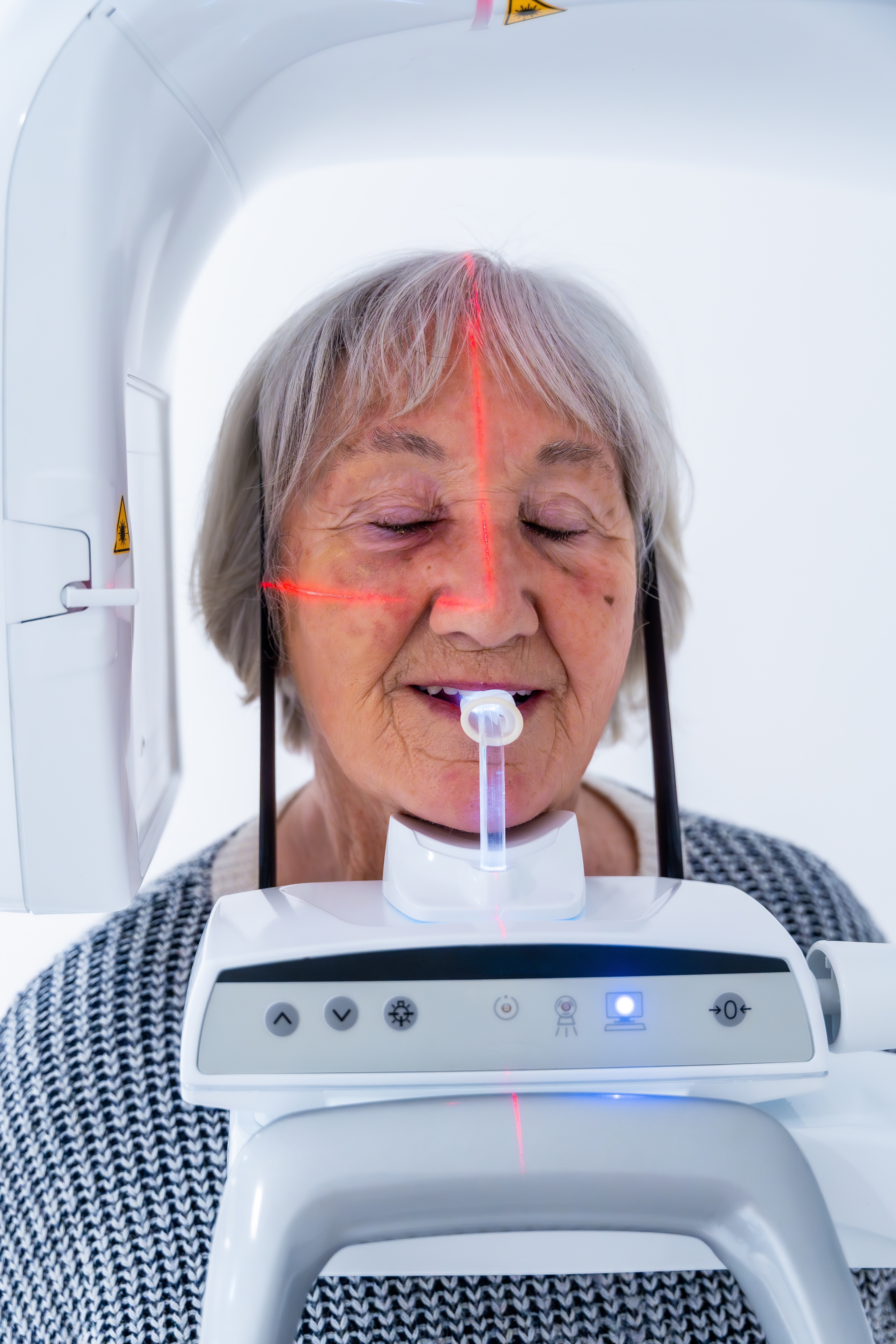 Senior woman getting a dental scan