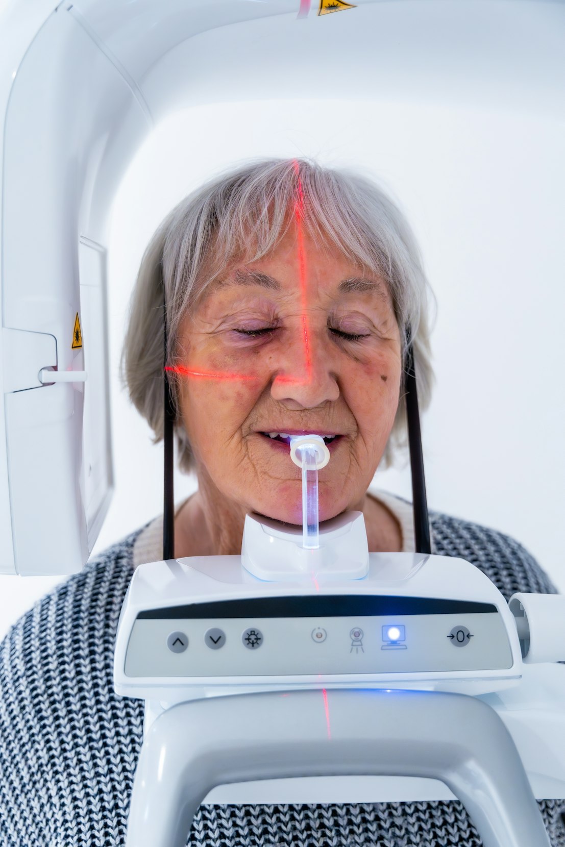 Senior woman getting a dental scan