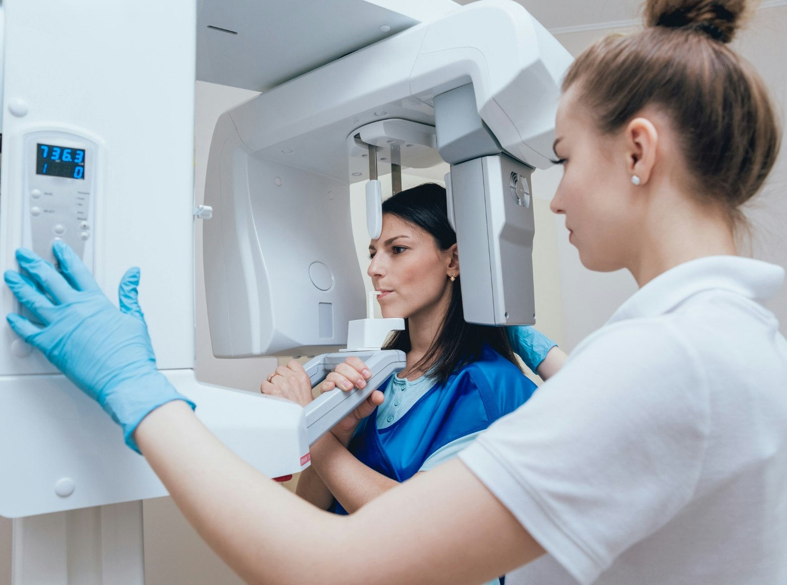 Woman having a 3D dental x-ray done