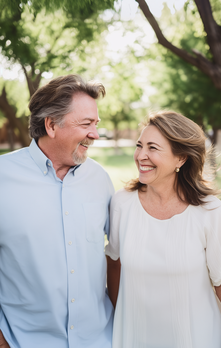 Man and woman smiling and walking outside